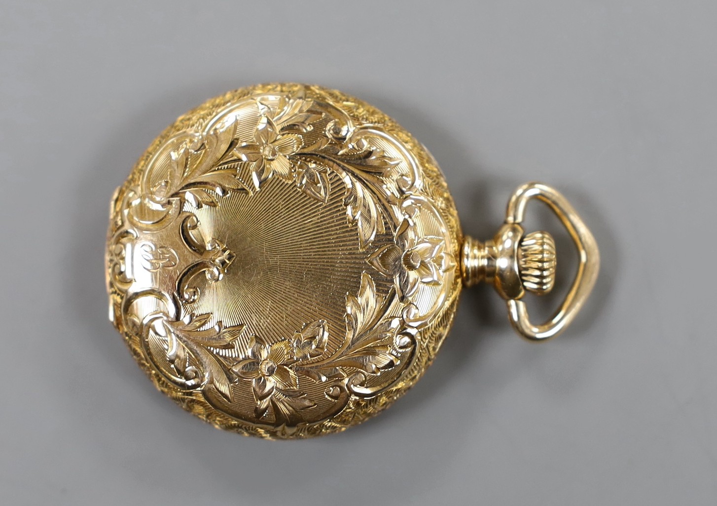 An early 20th century engraved 14k Waltham keyless hunter fob watch, with Arabic dial and engraved inscription